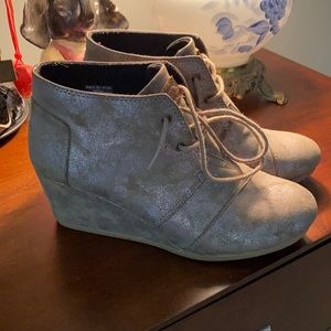Tom’s wedge booties.